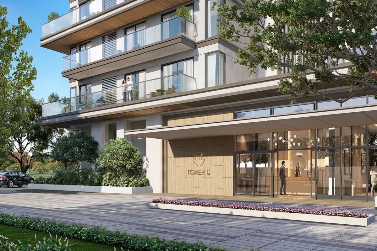 Emaar Serenity Hills Tower C entrance at Sector 86 Gurgaon featuring elegant drop-off lobby with modern architecture, glass facades, and premium residential tower design in New Gurugram